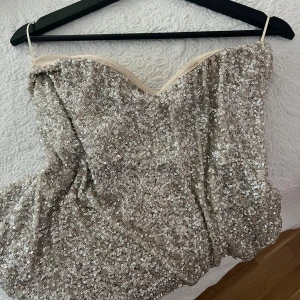 Gina glitter top - Glittrig överdel från Gina Tricot