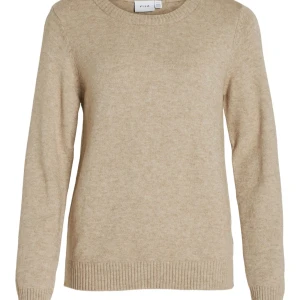 Beige stickad tröja från Vila - Säljer en beige stickad tröja från Vila. Tröjan har rund halsringning & långa ärmar. Det går att diskutera priset 💕💕