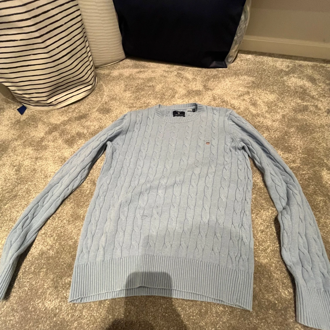 Ljusblå kabelstickad tröja från Gant