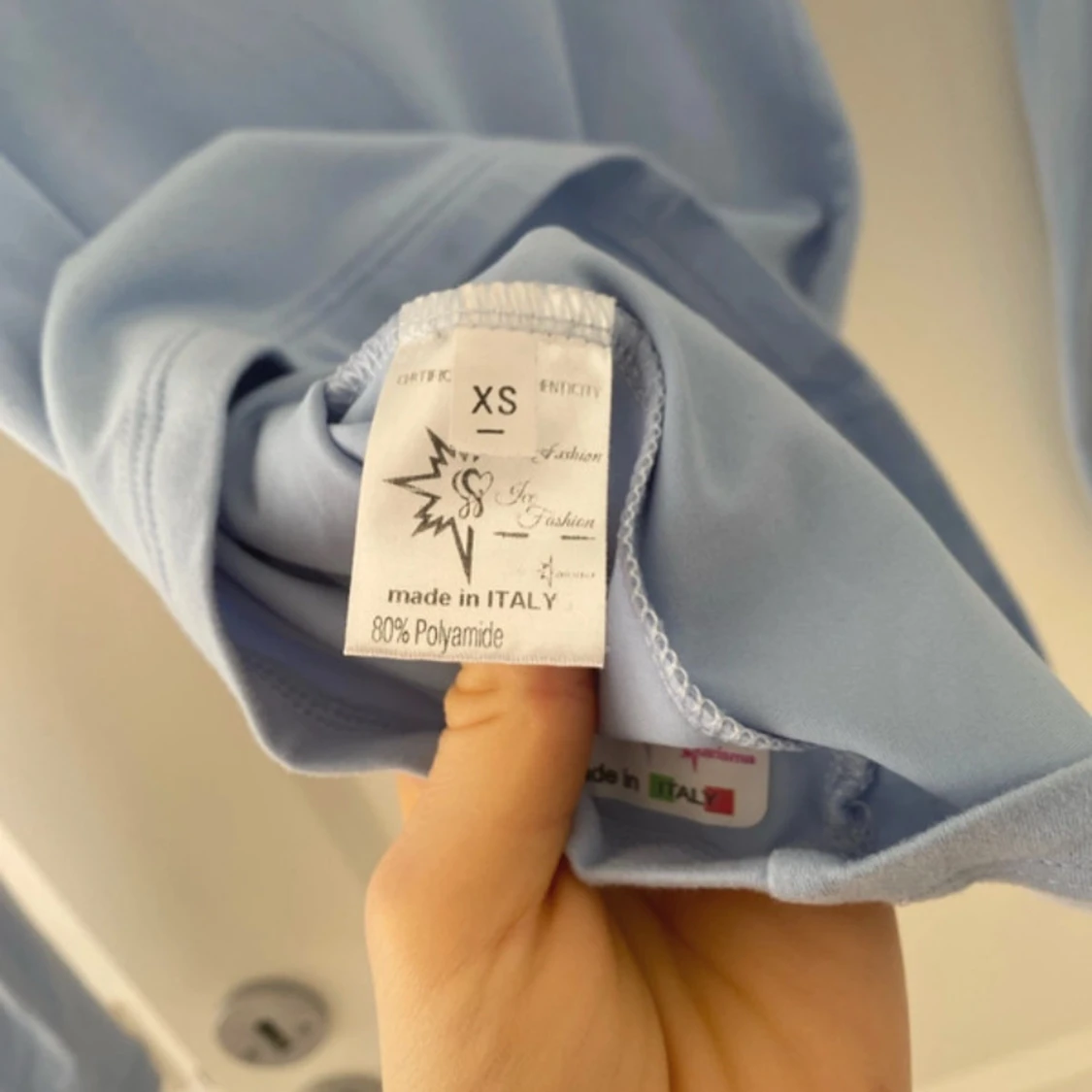 Ljusblå karisma tita topp - 2