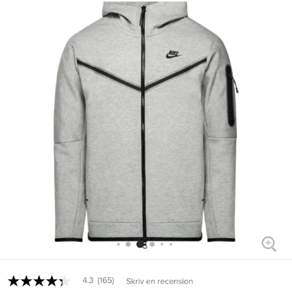 Grå hoodie från Nike med dragkedja
