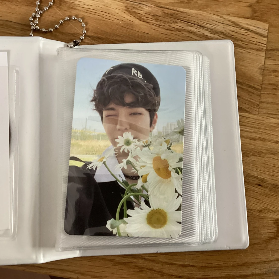 Fotokort med blommotiv i plastficka