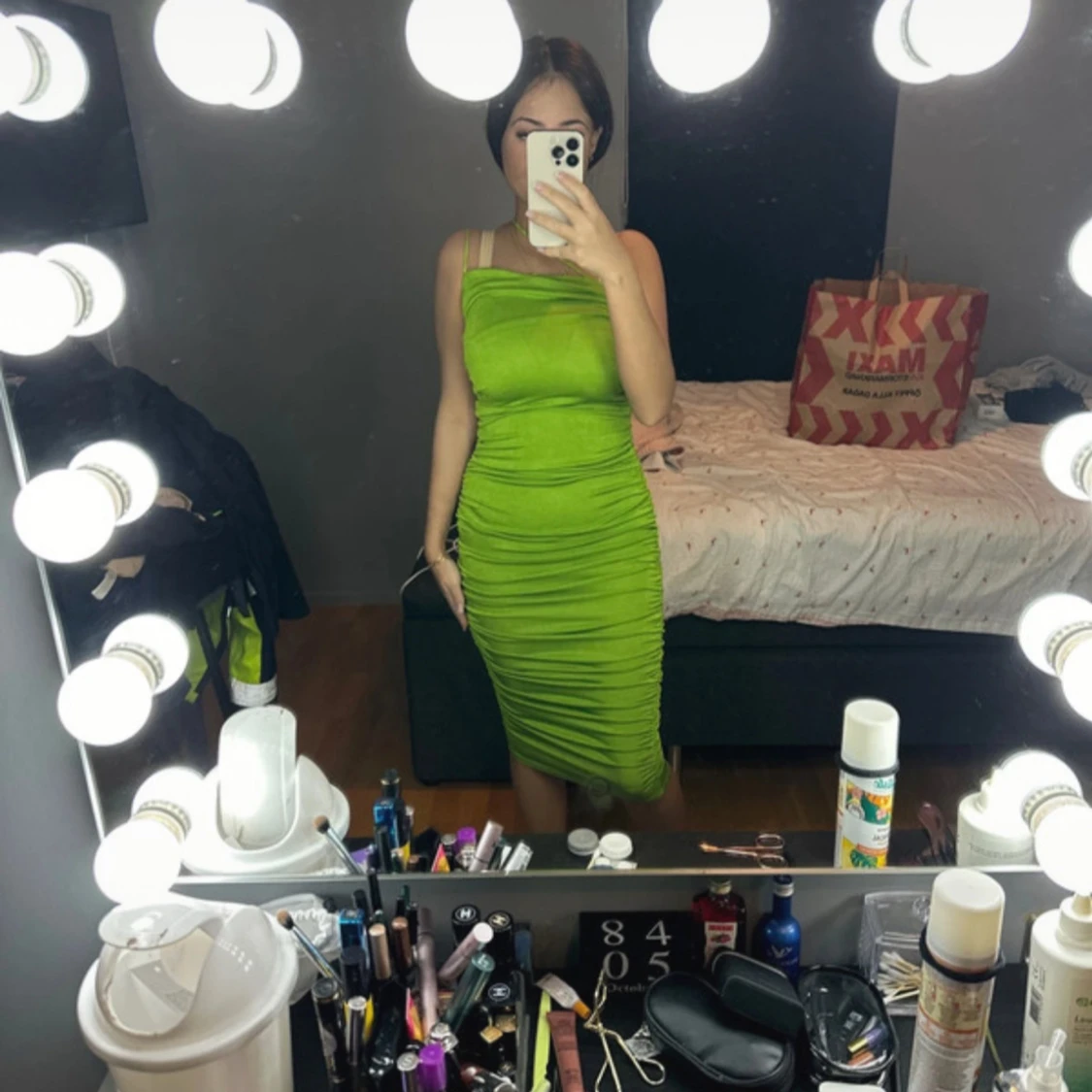 Grön omlottklänning med drapering