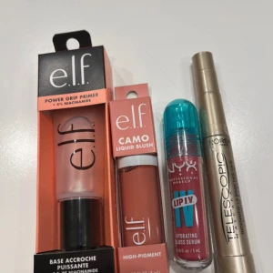 Sminkpaket med e.l.f, NYX & L'Oréal - Paket med e.l.f Power Grip Primer med 4% niacinamide, e.l.f Camo Liquid Blush i färgen Dusty Rosé, NYX Lip IV Hydrating Gloss Serum i rosa nyans och L'Oréal Telescopic Mascara i guldhylsa. Perfekt för dig som vill ha glow, färg och långa fransar.