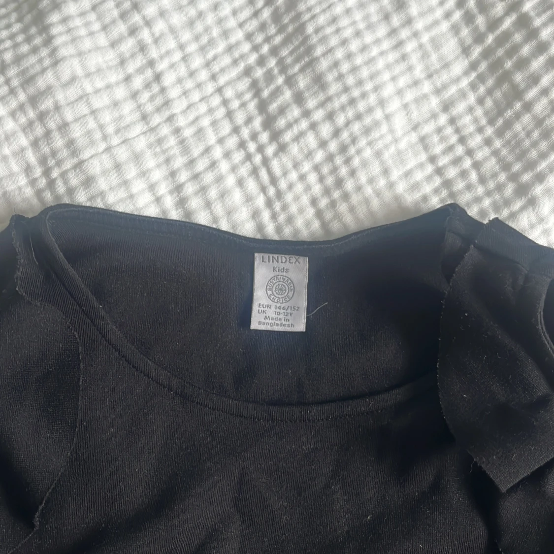 Svart långärmad topp med volang Lindex - 3