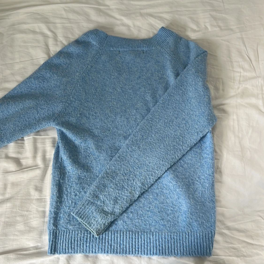 Ljusblå stickad tröja  - 3
