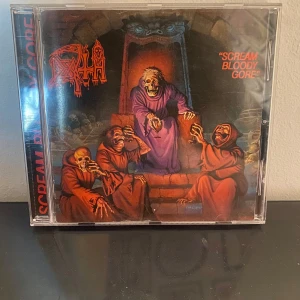 Death scream bloody gore cd - Cdn är i fint skick med inga repor på skivan eller konstigheter!