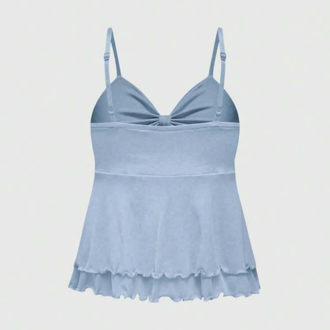 Ljusblå topp med rosett - 1