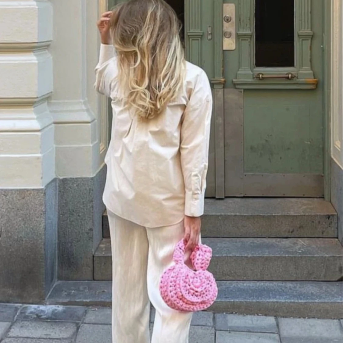 Rosa stickad handväska