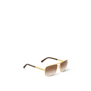 Louis Vuitton solglasögon  - Snygga solglasögon med guldfärgad metallram och bruna tonade glas. Skalmarna har en elegant design med mörka ändar för extra komfort. Perfekta för en stilren look. ÄKTA