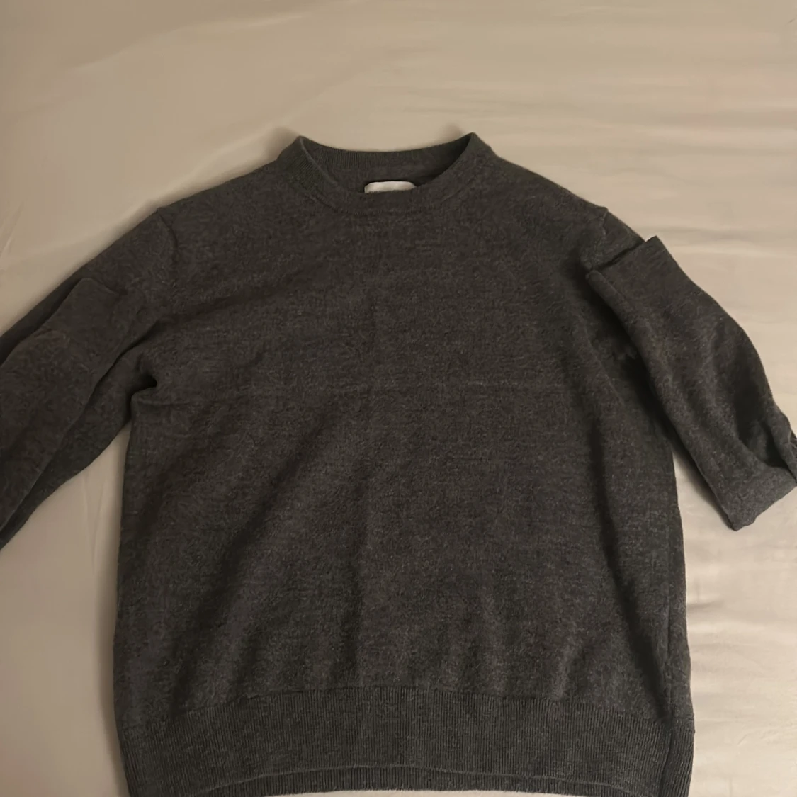 Grå merinoulltröja från These Glory Days