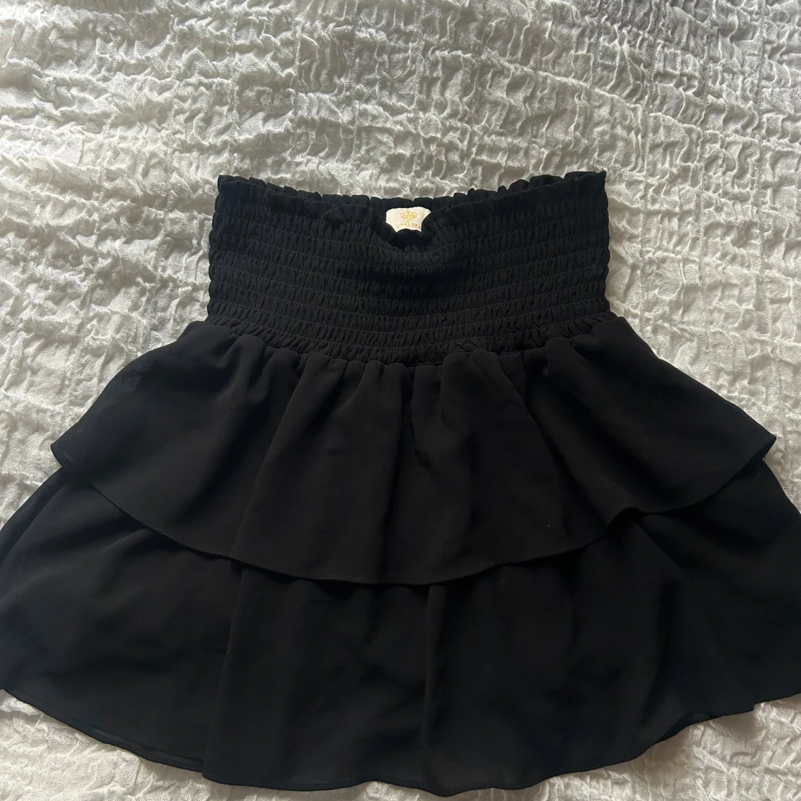 Svart volangkjol från Chelsea XS