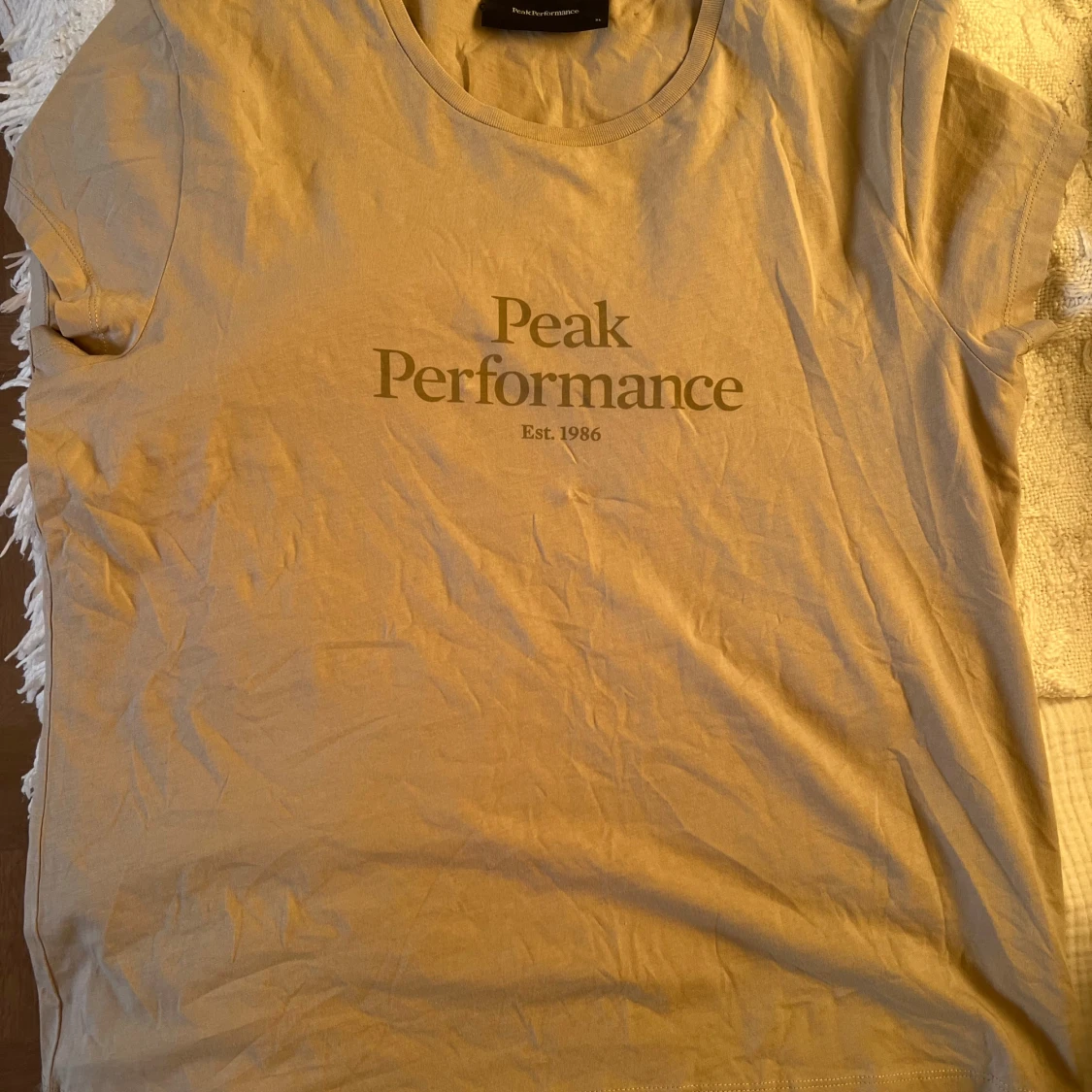 Beige Peak Performance t-shirt