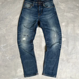 Nudie jeans blå - Nudie jeans blå storlek 27/30. Fint skick utan defekter. DM vid intresse! 