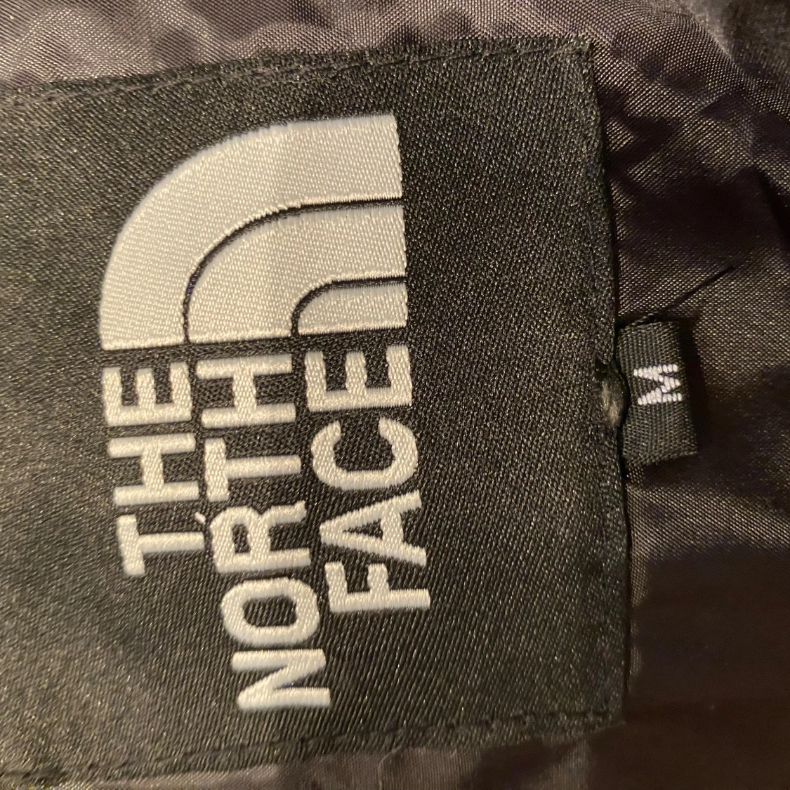 Svart pufferjacka från The North Face - 3