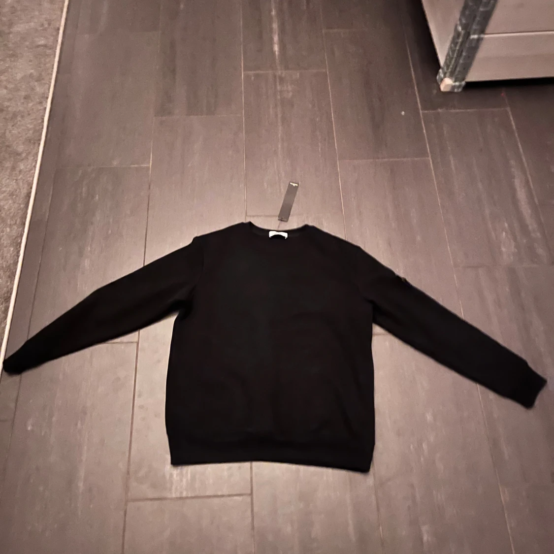 Svart sweatshirt från Stone Island