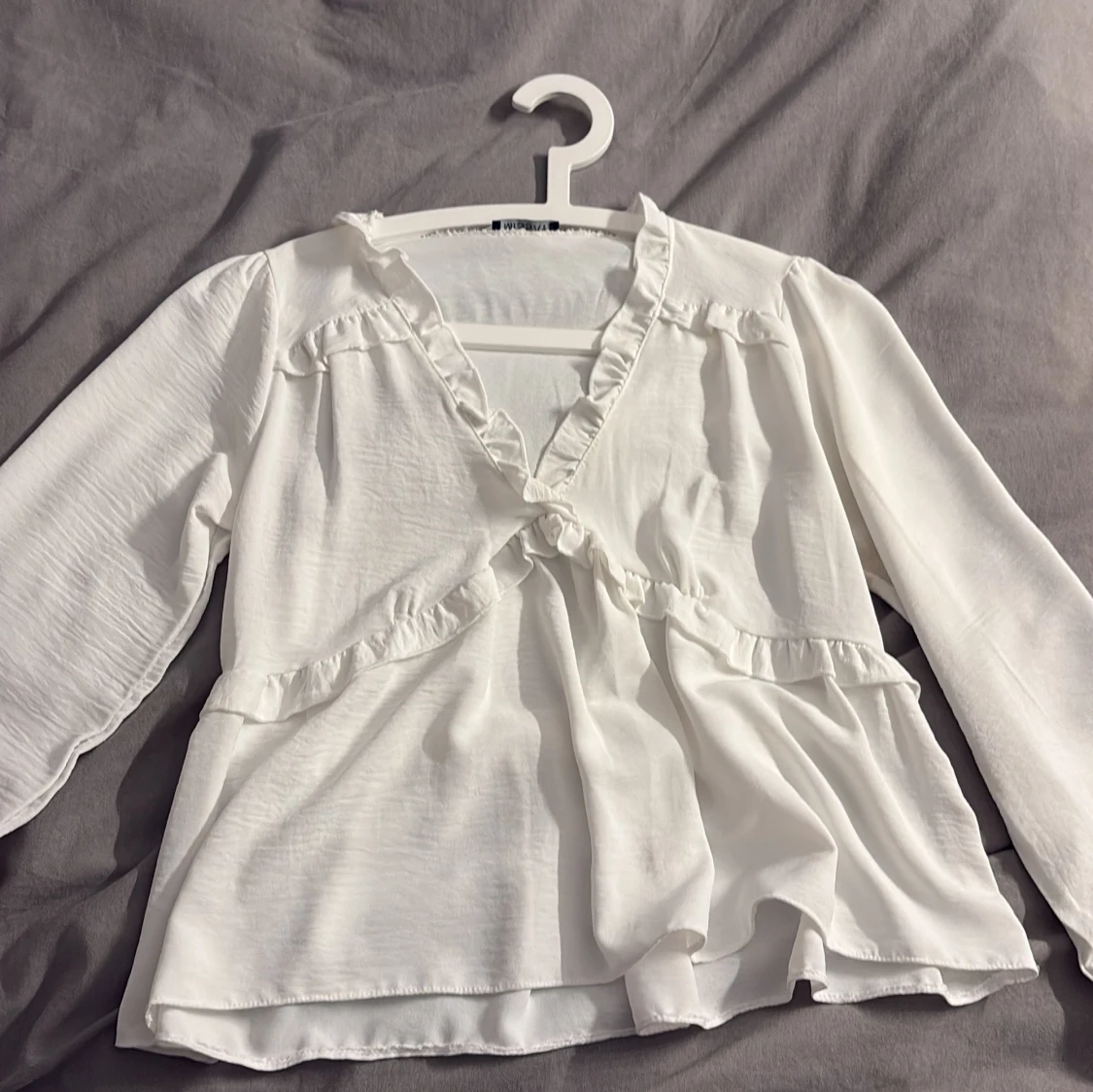 Vit blus från missay