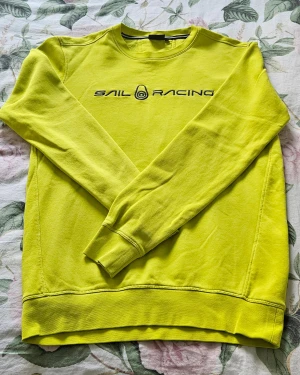 Sail Racing tröja  - Sail Racing tröja i strl M i gul/grön färg