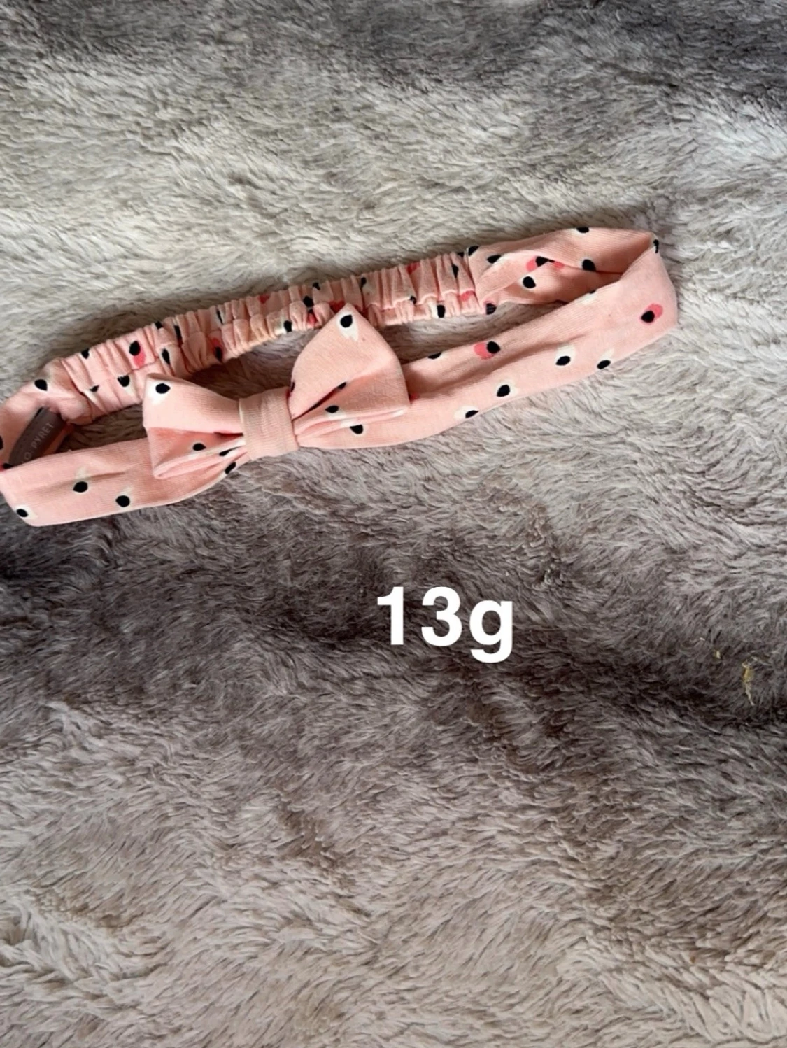 Rosa prickigt hårband med rosett