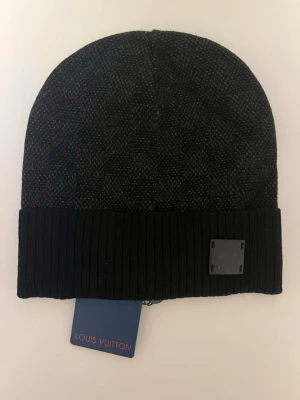 Lv mössa - Oanvänd, skickas inom kort tid