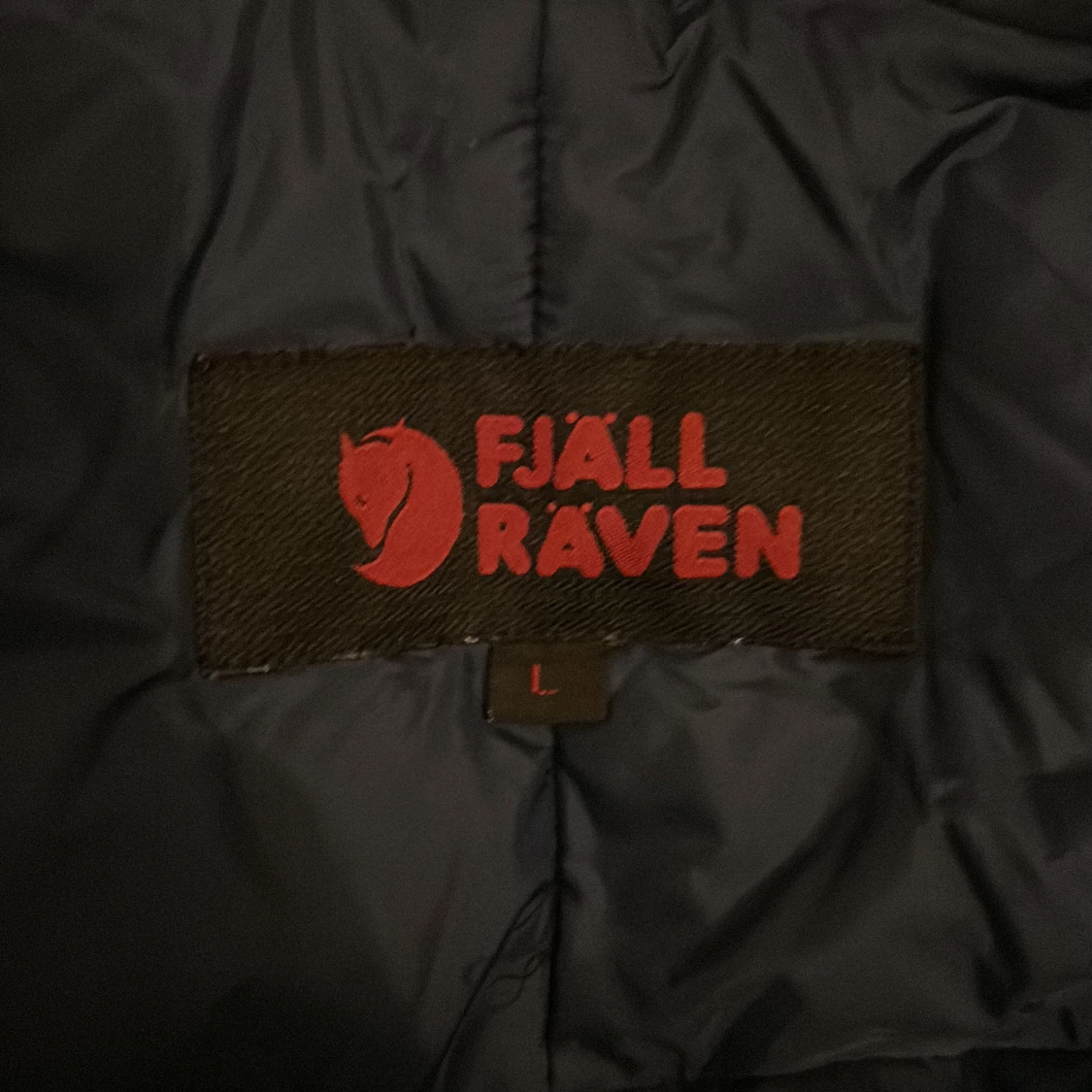 Mörkblå dunjacka från Fjällräven - 4