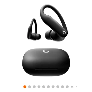 Beats Powerbeats Pro - Beats Powerbeats Pro trådlösa hörlurar i svart med laddningsetui. Ergonomisk design med öronbygel för säker passform, perfekt för träning. Produkten ser ut att vara i mycket gott skick utan synligt slitage eller defekter.
