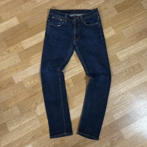 Mörkblå jeans från Nudie Jeans, 30/32 - Nudie jeans. W30 L32