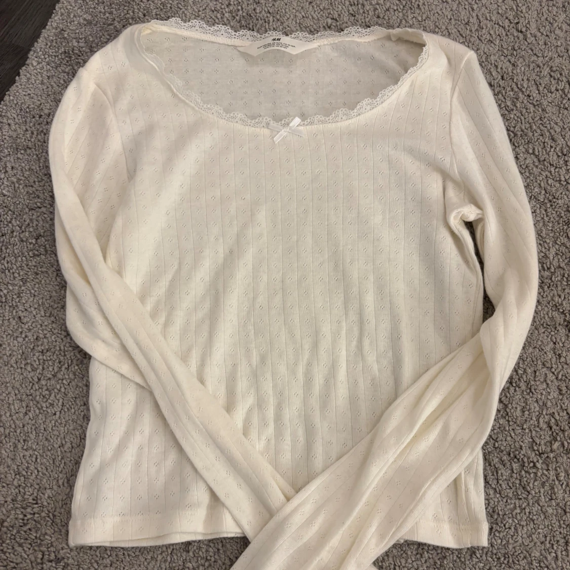 Vit långärmad topp med spets från H&M