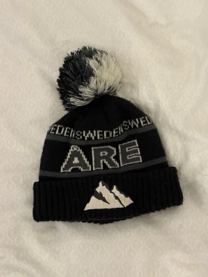 Svart Åre Mössa - Fint skick!