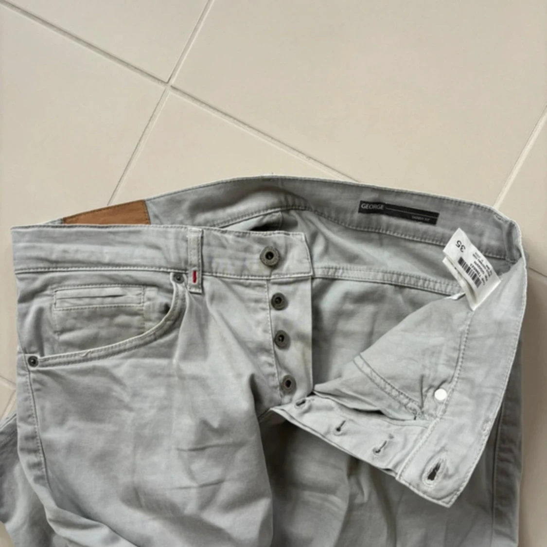 Ljusgrå skinny byxor från Dondup