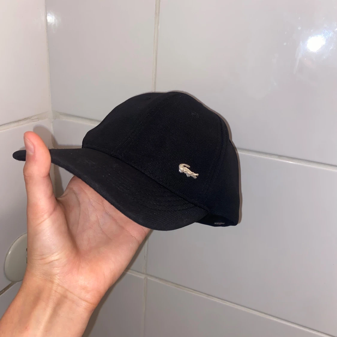 Svart Lacoste keps med krokodillogo