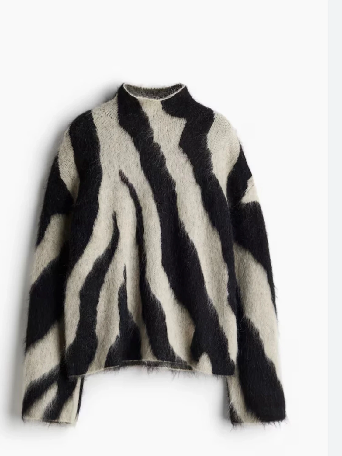 Beige och svart zebramönstrad stickad tröja