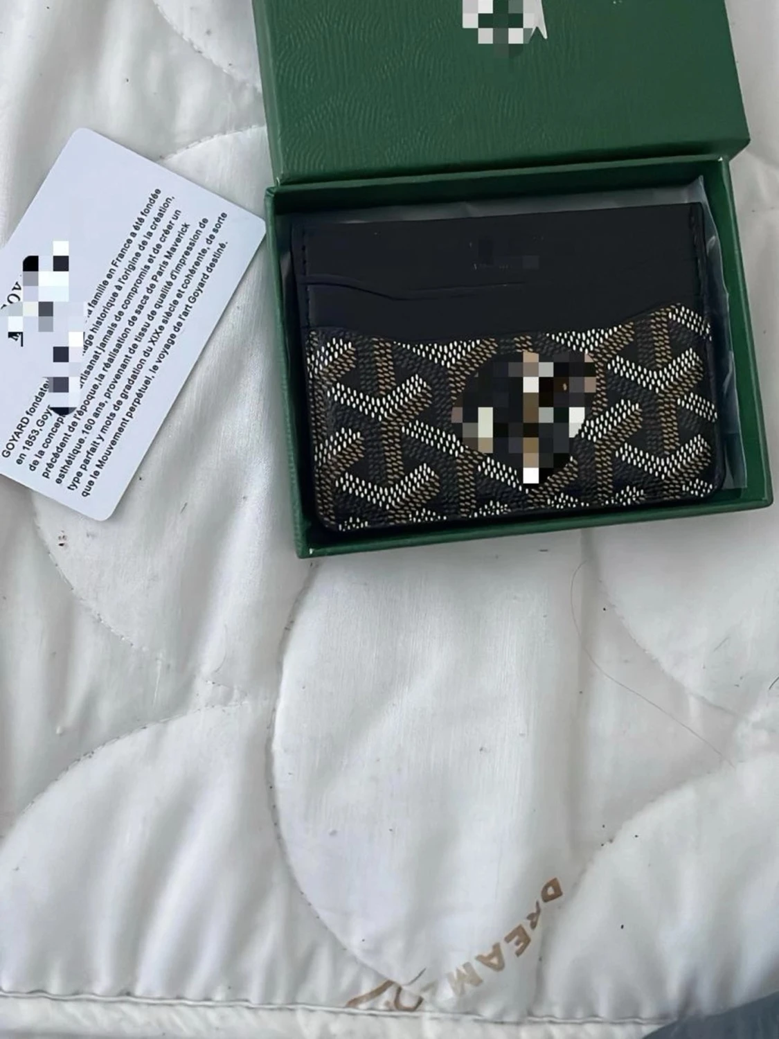 Svart och brun mönstrad plånbok