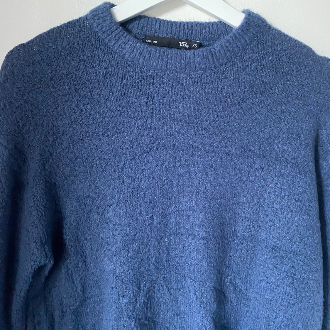 Blå stickad tröja från 157