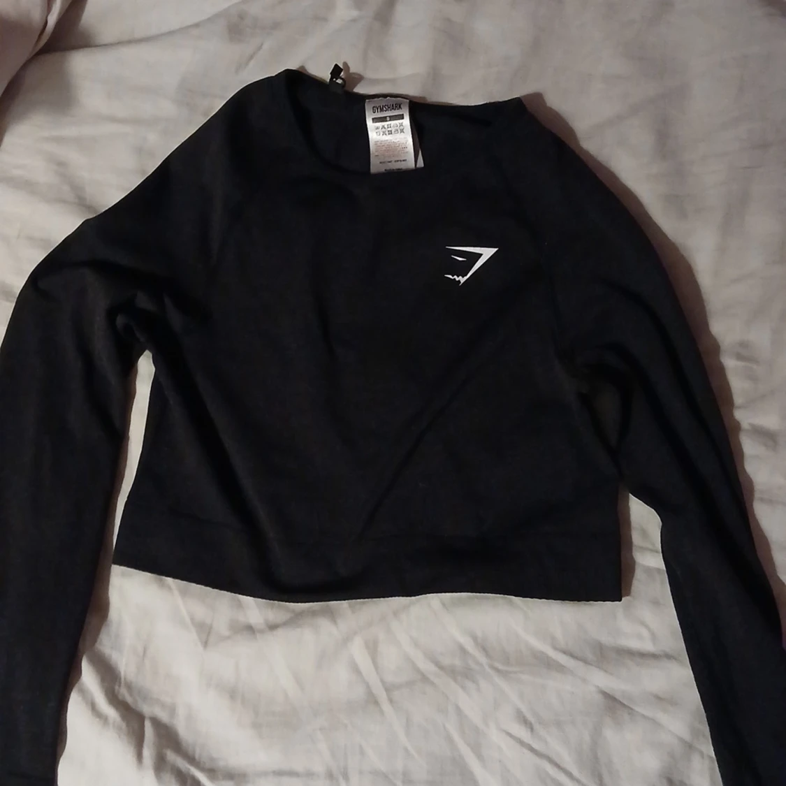 Svart långärmad crop top från Gymshark - 1