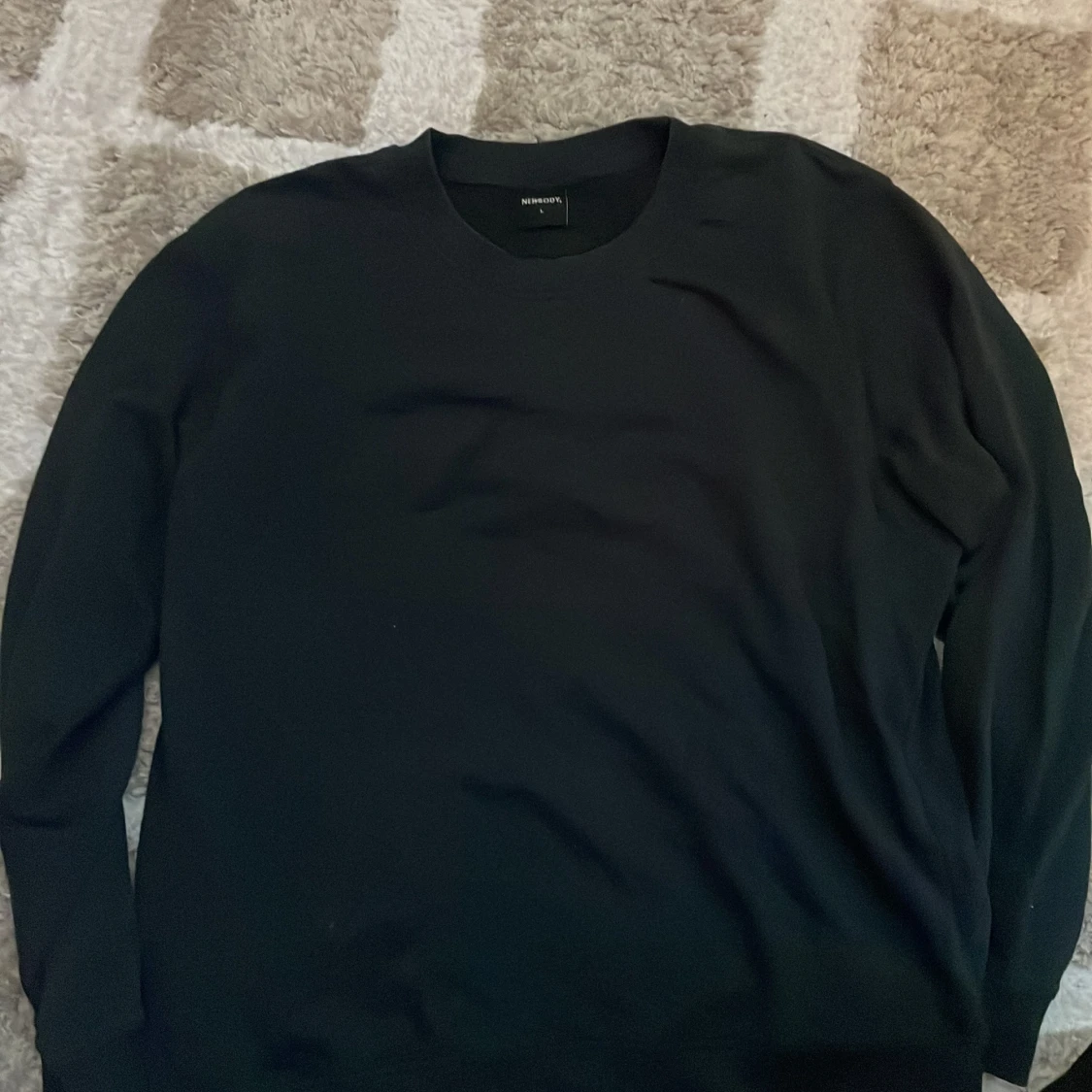 Svart sweatshirt från Newbody L
