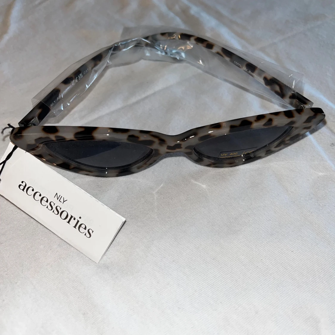 Leopardmönstrade cat eye-solglasögon NLY - 3
