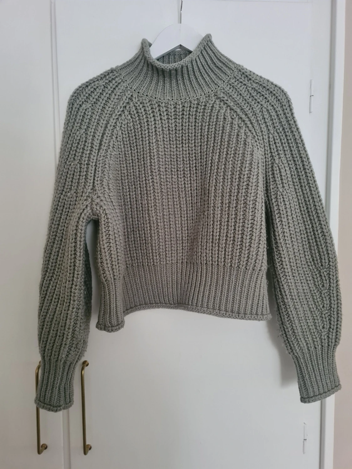 Grön stickad polotröja från H&M