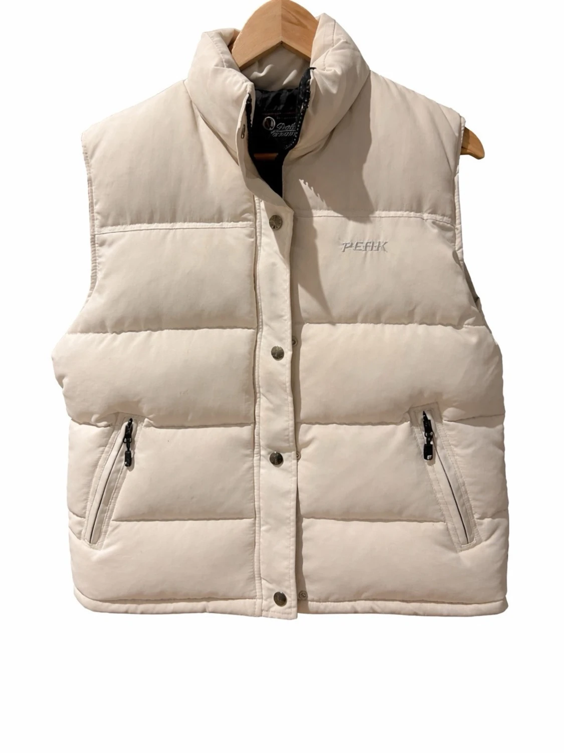 Beige dunväst från Peak Performance