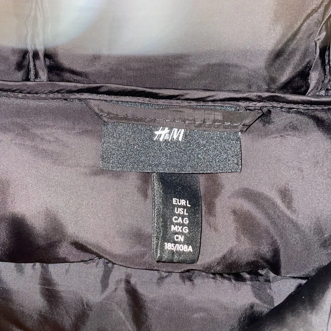 Svart dunväst med huva från H&M - 2