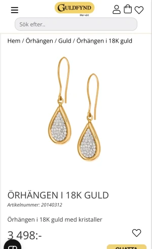 Guldörhängen med kristaller - Droppformade örhängen i 18K guld från Guldfynd, dekorerade med kristaller. De har en elegant och tidlös design med guldinfattning och glittrande stenar som fångar ljuset. Perfekta för dig som vill ha något extra snyggt till din stil. Perfekt som julklapp. Säljer pga att de inte kommer till användning. Asken på bilden fås med!