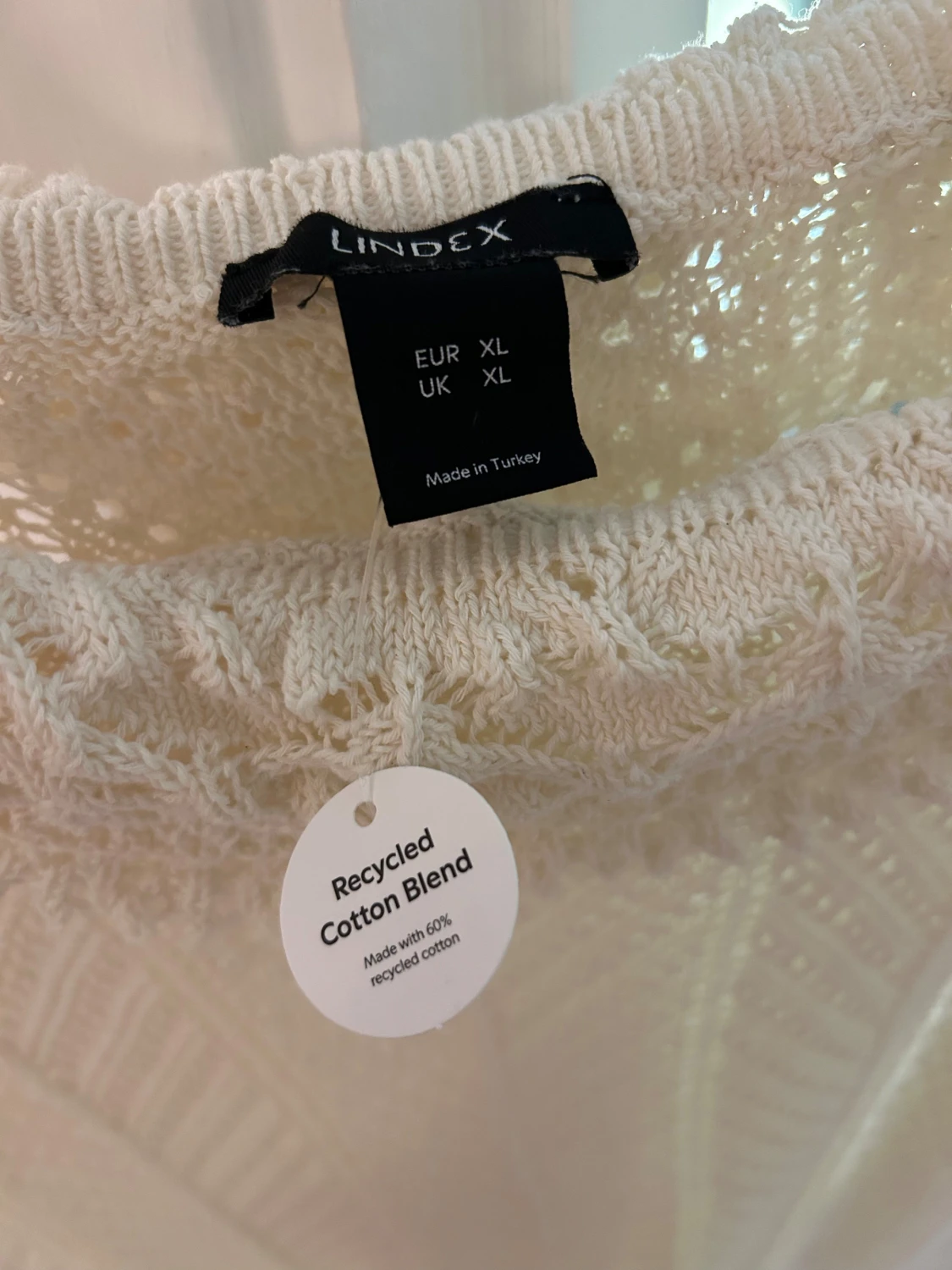 Stickad klänning med prislapp - 2