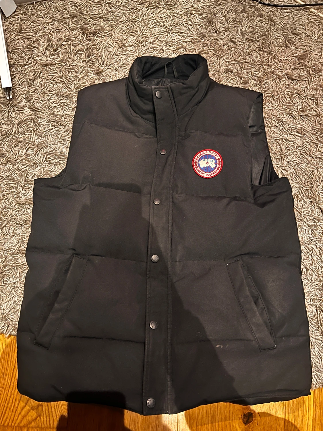 Svart dunväst från Canada Goose M