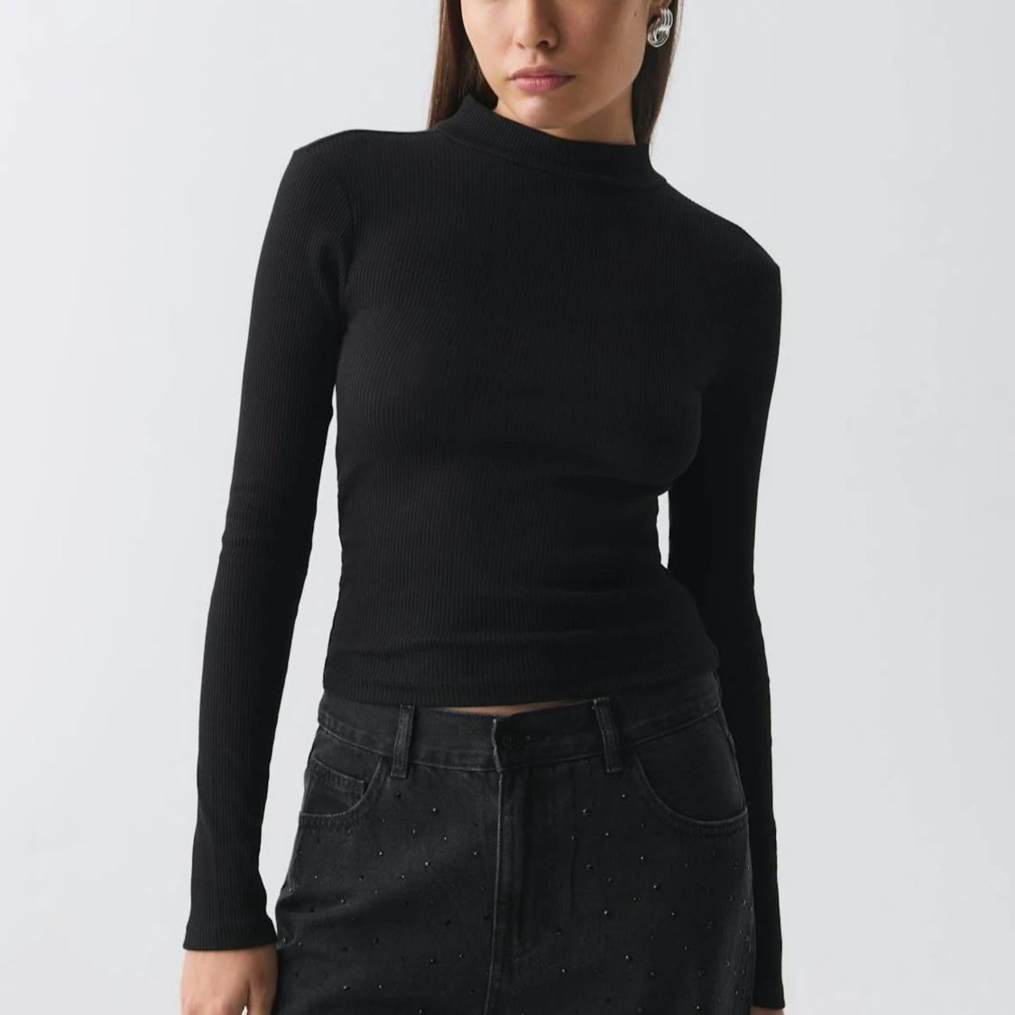 Svart ribbad långärmad topp med rosett - 1