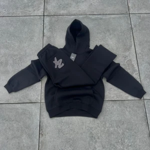 AZERO tracksuit  - Onyx black and stone gray tracksuit available in both M and L