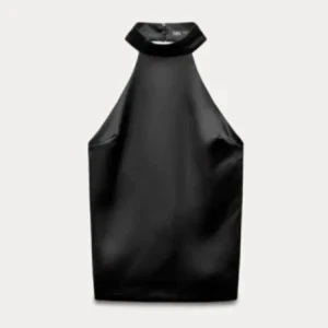 satin topp  - svart satin topp som är använd ett par gånger men är i mycket bra skick. andra bilden har jag lånat från safari då jag inte har en bild med den på och bilden visar tydligt hur toppen ser ut på. säljer pga att den inte passar längre. inga defekter.