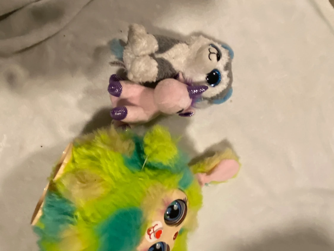 Blå glittrig väst till docka - 1