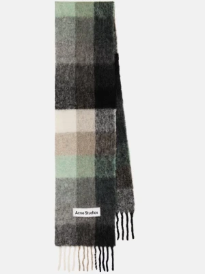 Rutig ullväst från Acne Studios - Säljer en sjukt snygg rutig väst från Acne Studios i mjuk ullmix. Västen har breda rutor i svart, grått, beige, vitt och grönt, med långa fransar nedtill och Acne Studios-logga framtill. Perfekt för lager-på-lager och att ge din outfit en cool touch.