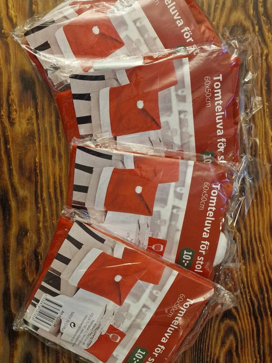 4 stycken röda tomteluvor för stol 60x50cm