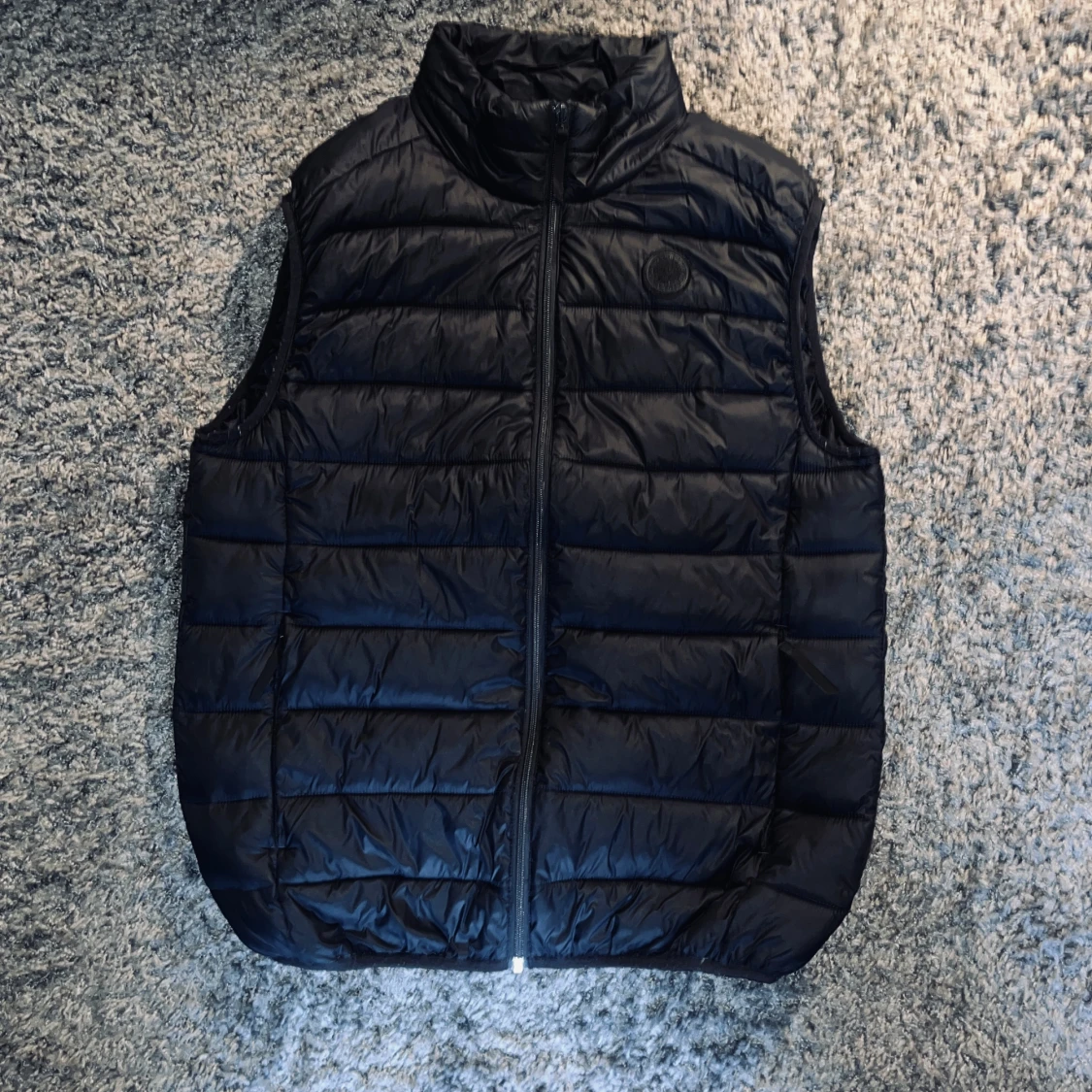 Svart dunväst från Lindbergh XL